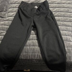 Black softball pants from The Gluv Athletique